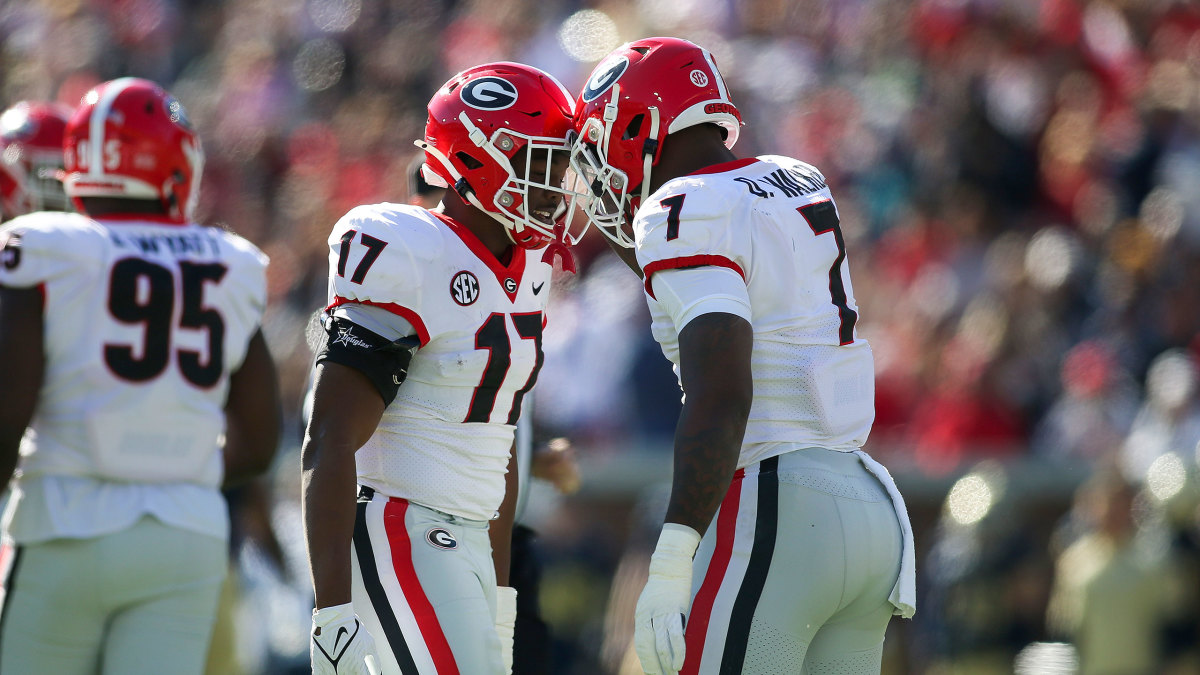 Georgia's Nakobe Dean and Quay Walker celebrate