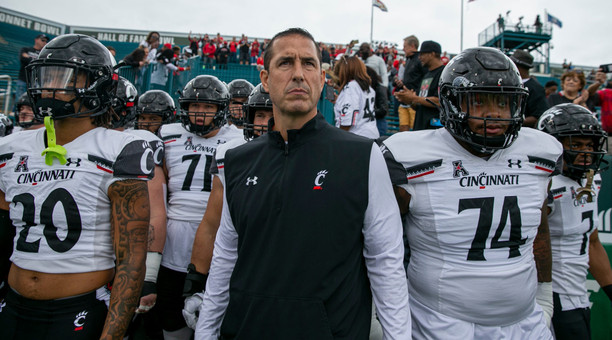 Cincinnati football coach Luke Fickell with his Bearcats team.