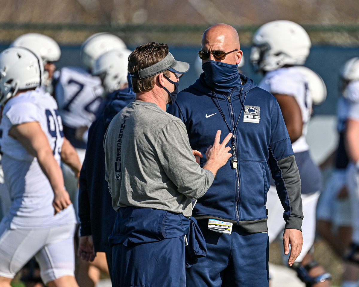 Penn State coach James Franklin with former defensive coordinator Brent Pry at practice. (Photo courtesy Penn State Athletics)