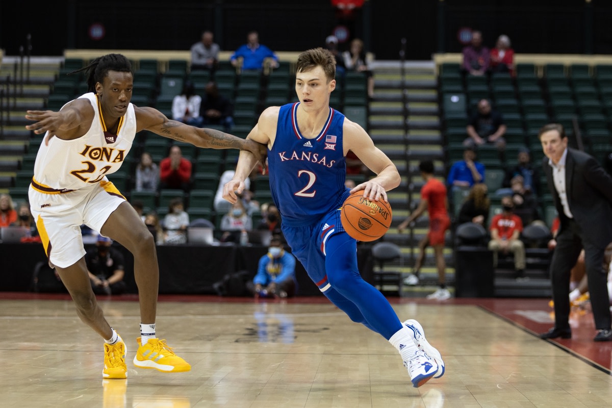 Nov 28, 2021; Orlando, FL, USA; Kansas Jayhawks guard Christian Braun (2) dribbles the ball against the Iona Gaels in the second half at HP Field House. Mandatory Credit: Jeremy Reper-USA TODAY Sports