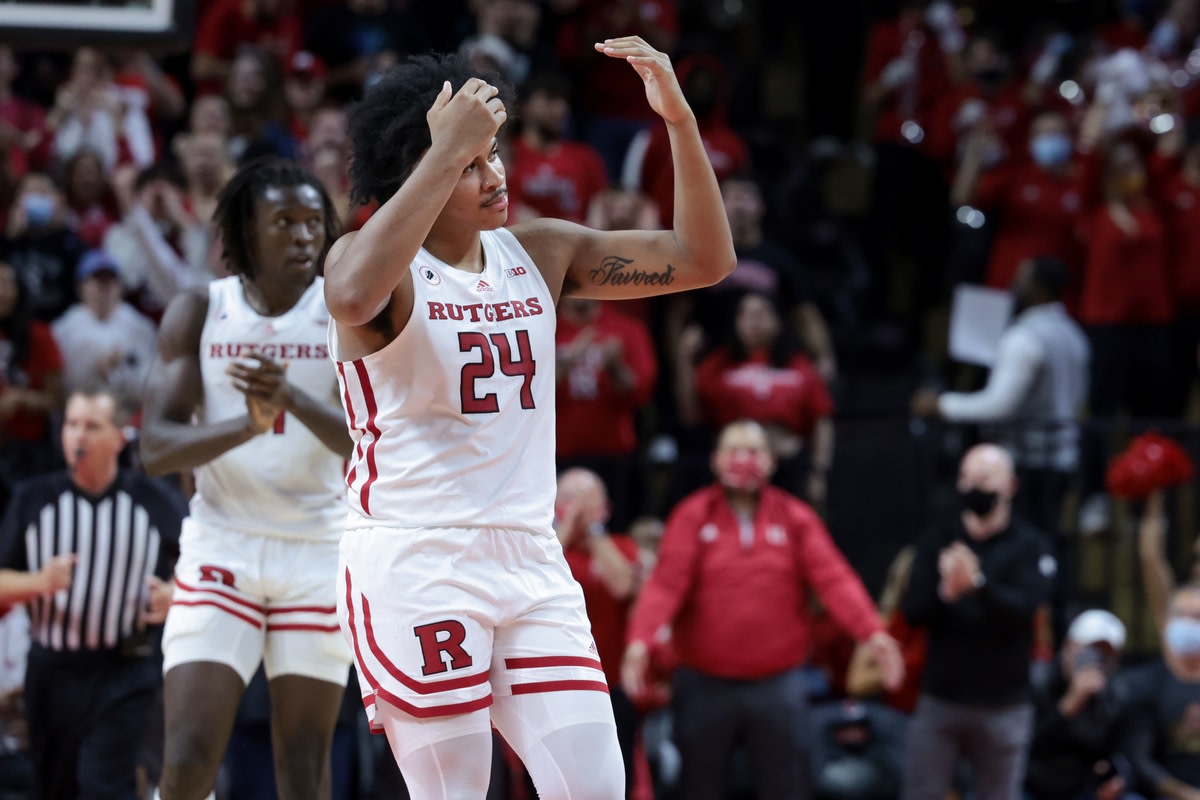 Nov 30, 2021; Piscataway, New Jersey, USA; Rutgers Scarlet Knights forward Ron Harper Jr. (24) reacts after making a three point basket against the Clemson Tigers during the second half at Jersey Mike's Arena. Mandatory Credit: Vincent Carchietta-USA TODAY Sports