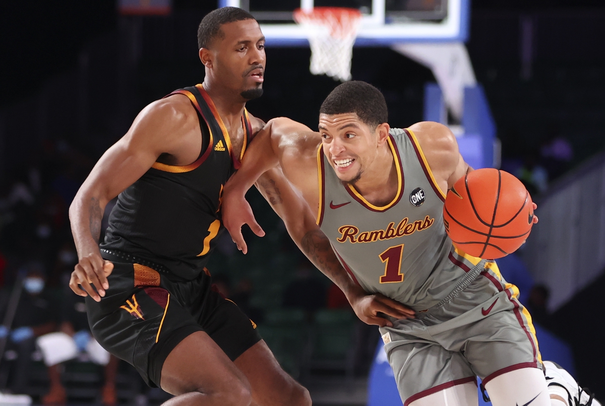 Nov 26, 2021; Nassau, BHS; Loyola Ramblers guard Lucas Williamson (1) drives to the basket as Arizona State Sun Devils guard Luther Muhammad (1) defends during the first half in the 2021 Battle 4 Atlantis at Imperial Arena. Mandatory Credit: Kevin Jairaj-USA TODAY Sports