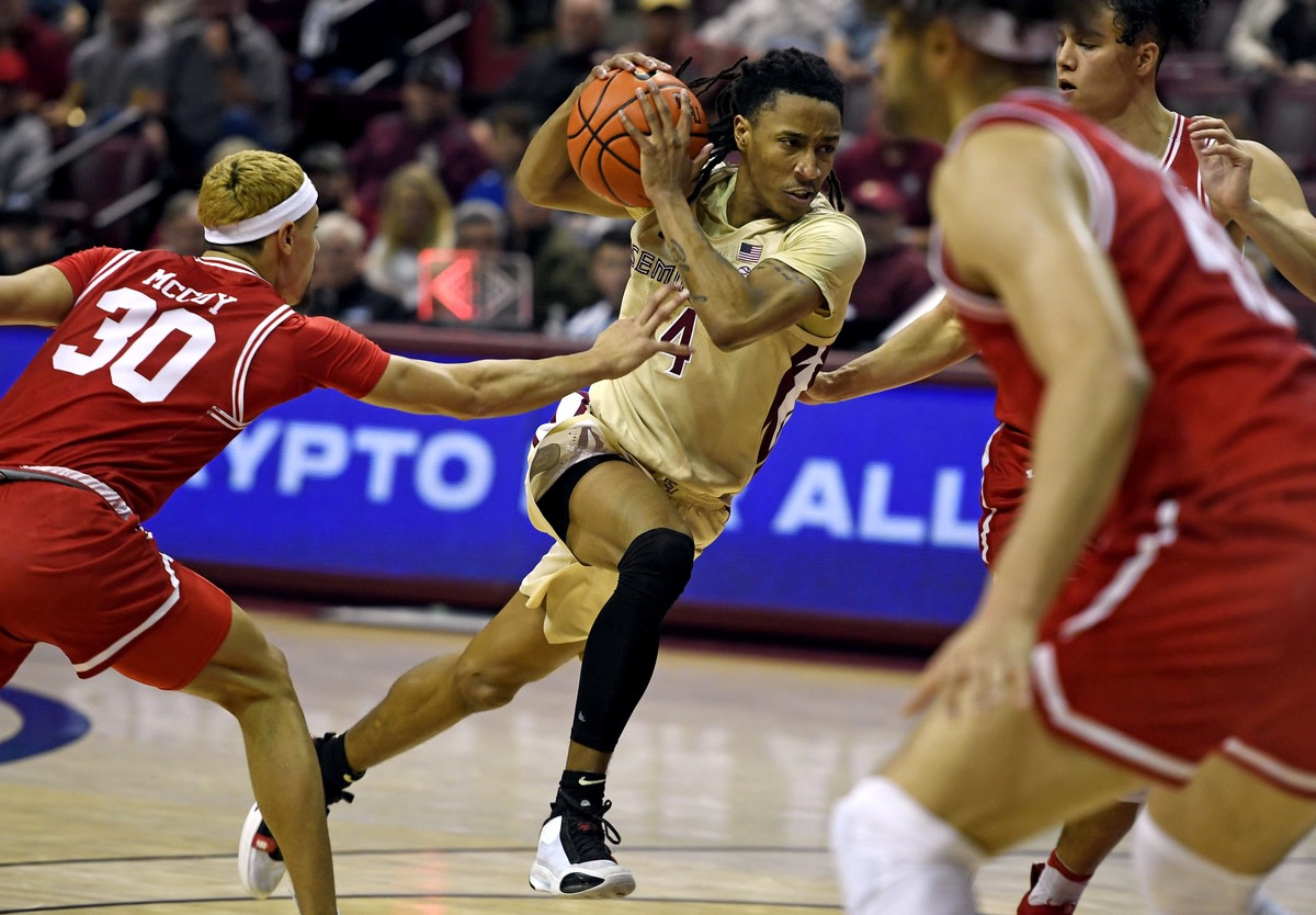 Nov 24, 2021; Tallahassee, Florida, USA; Florida State Seminoles guard Caleb Mills (4) drives the ball towards the net during the game against the Boston University Terriers at Donald L. Tucker Center. Mandatory Credit: Melina Myers-USA TODAY Sports