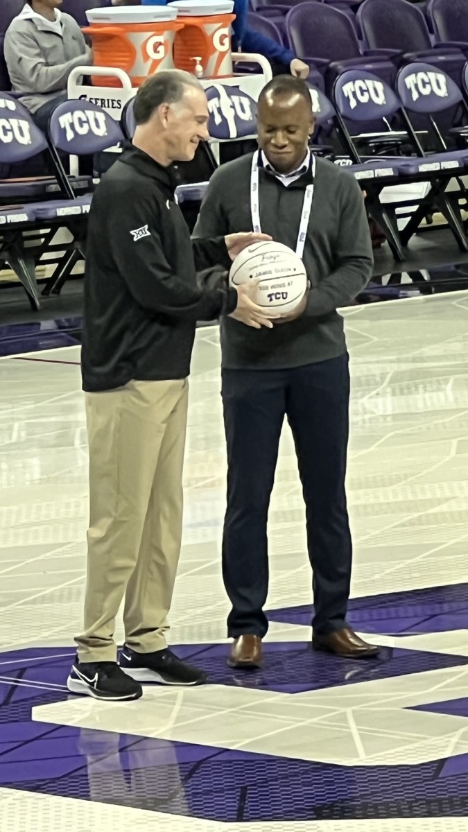 Coach Jamie Dixon was honored before the Oral Roberts game for his 100th win at TCU.