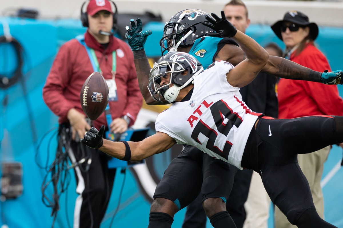 A.J. Terrell jumps in front with his arm out and breaks up a pass to Jacksonville Jaguars wide receiver Marvin Jones Jr.