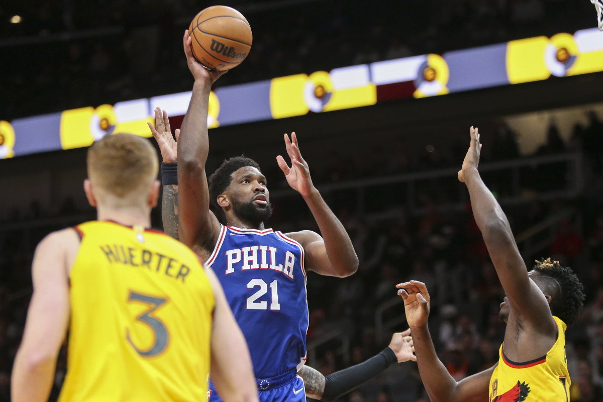 Philadelphia 76ers center Joel Embiid (21) shoots against the Atlanta Hawks in the first quarter at State Farm Arena.