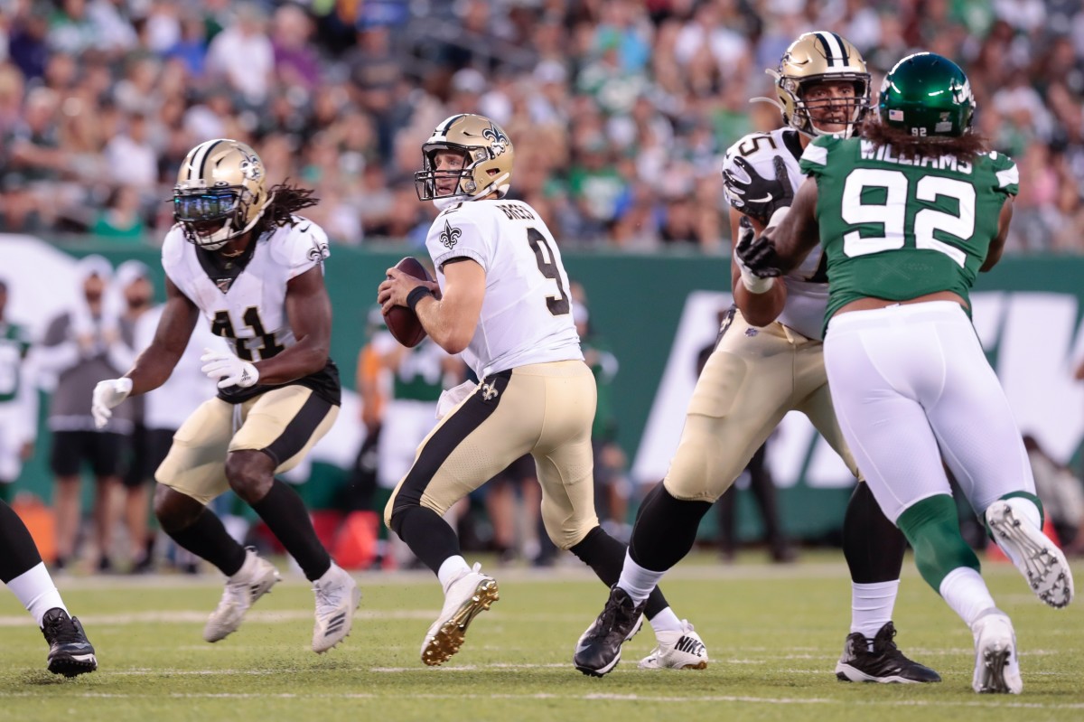 New Orleans Saints quarterback Drew Brees (9) drops back to pass against the New York Jets. Mandatory Credit: Vincent Carchietta-USA TODAY 