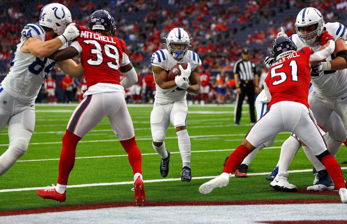 Indianapolis Colts running back Jonathan Taylor (28) runs in a touchdown during the first quarter of the game Sunday, Dec. 5, 2021, at NRG Stadium in Houston. Indianapolis Colts Versus Houston Texans On Sunday Dec 5 2021 At Nrg Stadium In Houston Texas