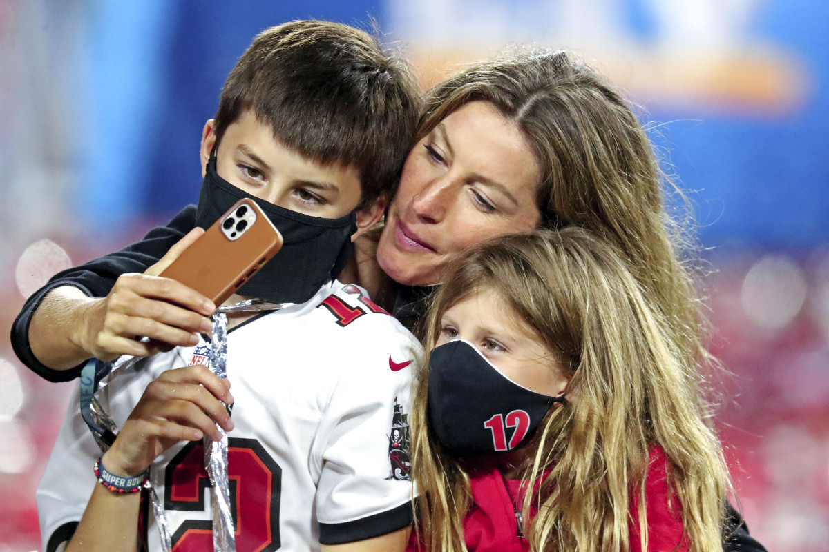 Tom Brady's son Ben, wide Gisele and daughter Vivian on the field after Super Bowl LV