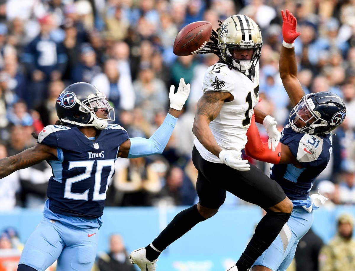 Titans cornerback Janoris Jenkins (20) and safety Kevin Byard (31) break up a pass intended for Saints receiver Kevin White (17). George Walker IV / Tennessean.com / USA TODAY NETWORK