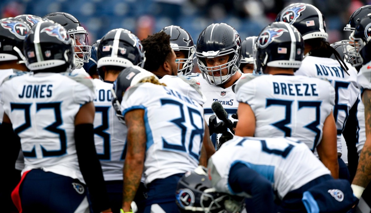 The Titans huddle on field as they prepare to face the Patriots at Gillette Stadium Sunday, Nov. 28, 2021 in Foxborough, Mass.