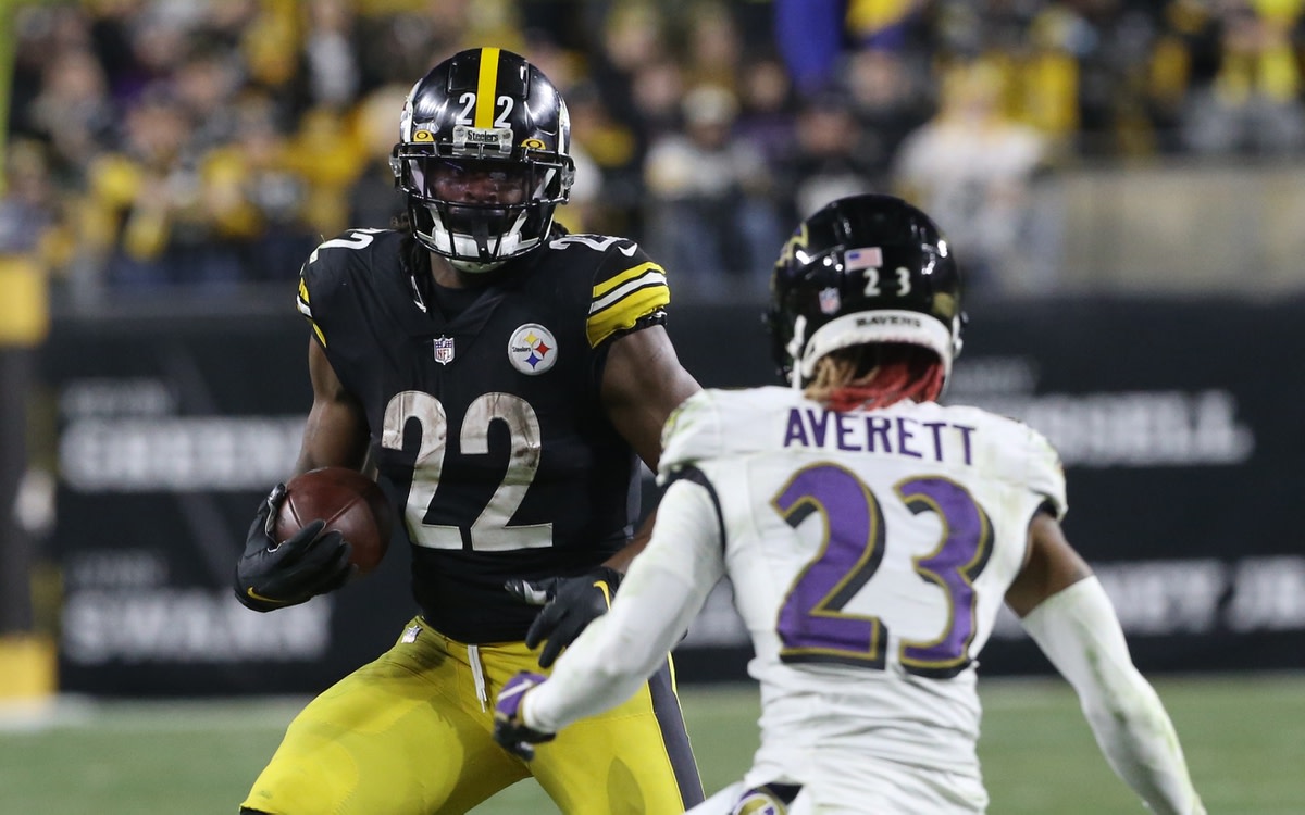 Dec 5, 2021; Pittsburgh, Pennsylvania, USA; Pittsburgh Steelers running back Najee Harris (22) carries the ball against Baltimore Ravens cornerback Anthony Averett (23) during the fourth quarter at Heinz Field. Pittsburgh won 20-19. Mandatory Credit: Charles LeClaire-USA TODAY Sports