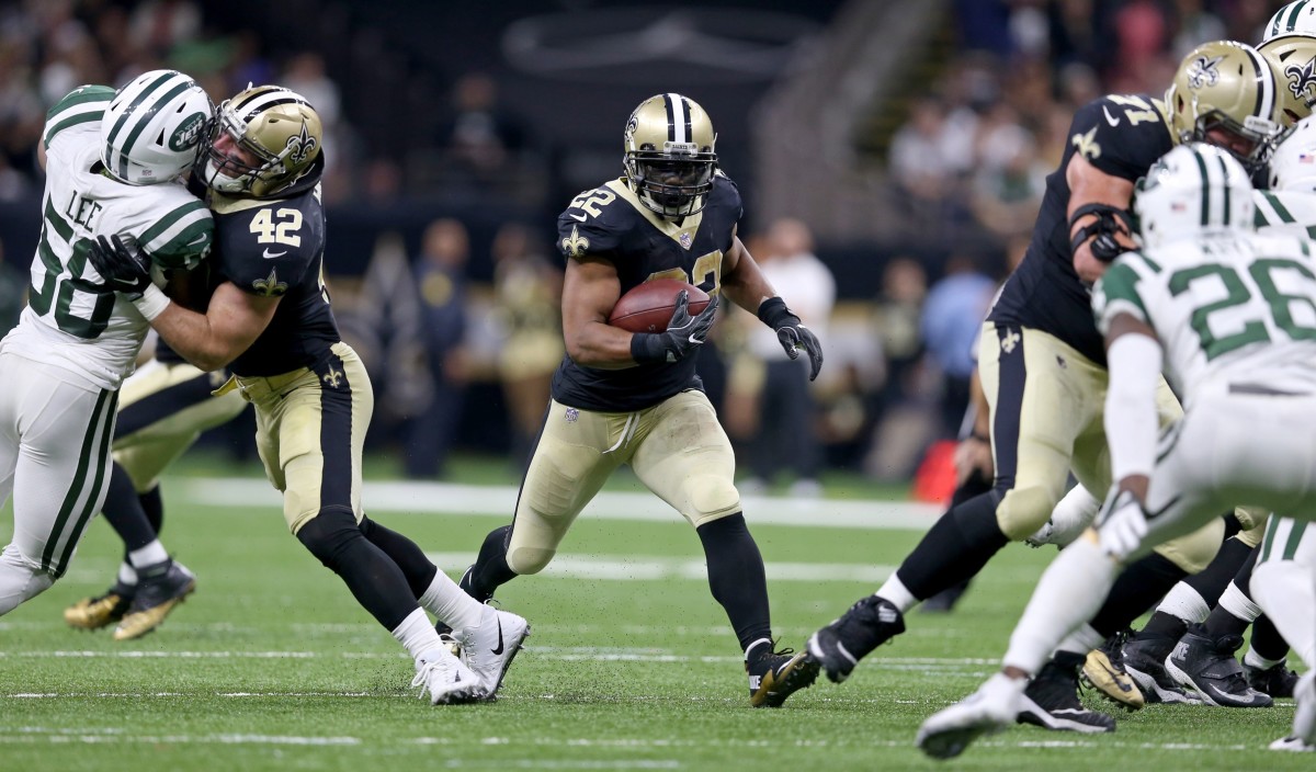 Dec 17, 2017; New Orleans Saints running back Mark Ingram (22) runs through a hole against the New York Jets. Mandatory Credit: Chuck Cook-USA TODAY Sports