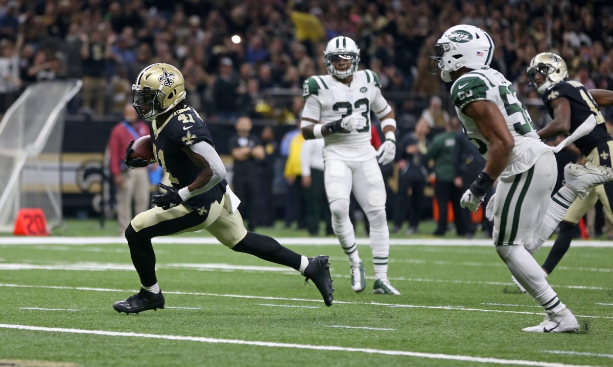 New Orleans Saints running back Alvin Kamara (41) scores a touchdown against the New York Jets. Mandatory Credit: Chuck Cook-USA TODAY 