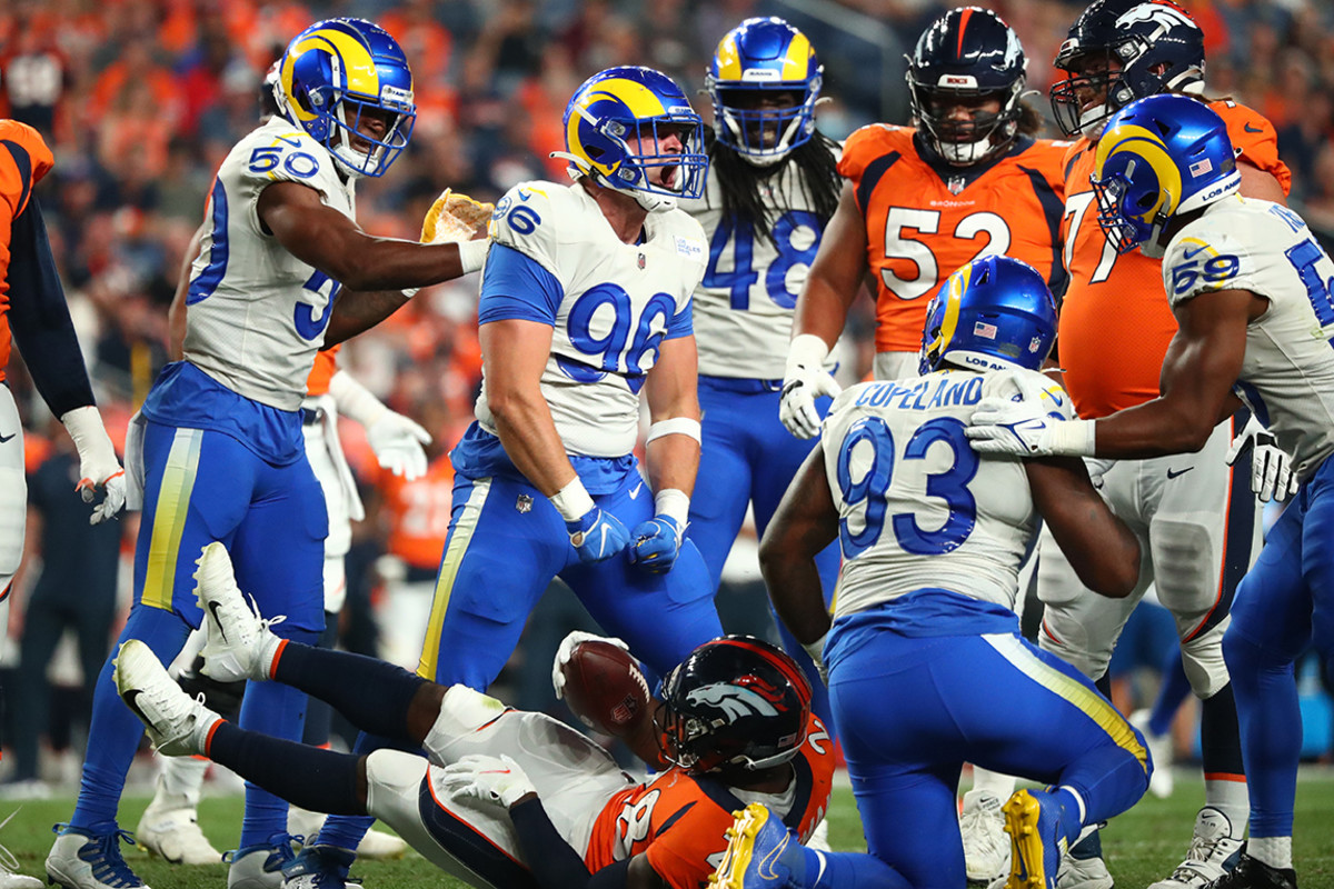 Rams defensive tackle Michael Hoecht celebrates a tackle during a preseason win over the Broncos