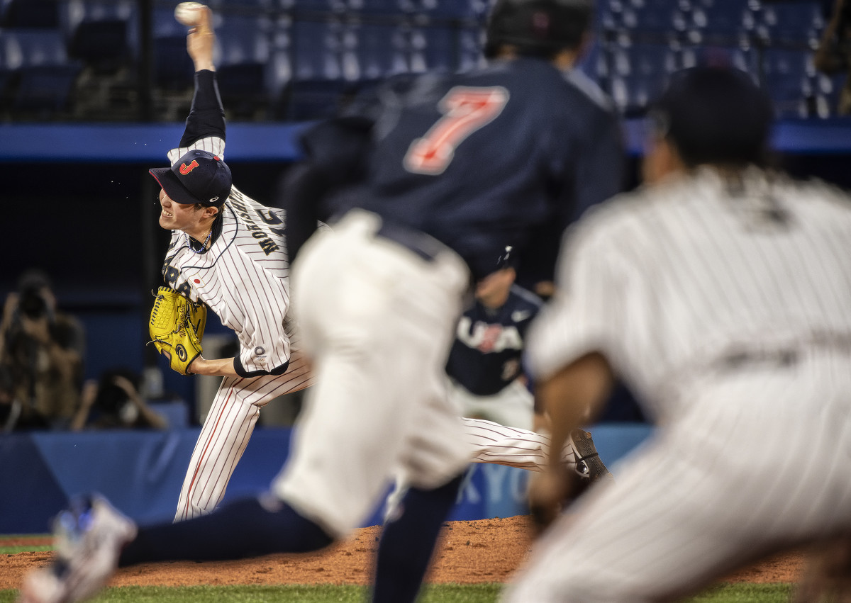 Japan's Masato Morishita pitches against the United States in the 2020 Olympic gold medal game.