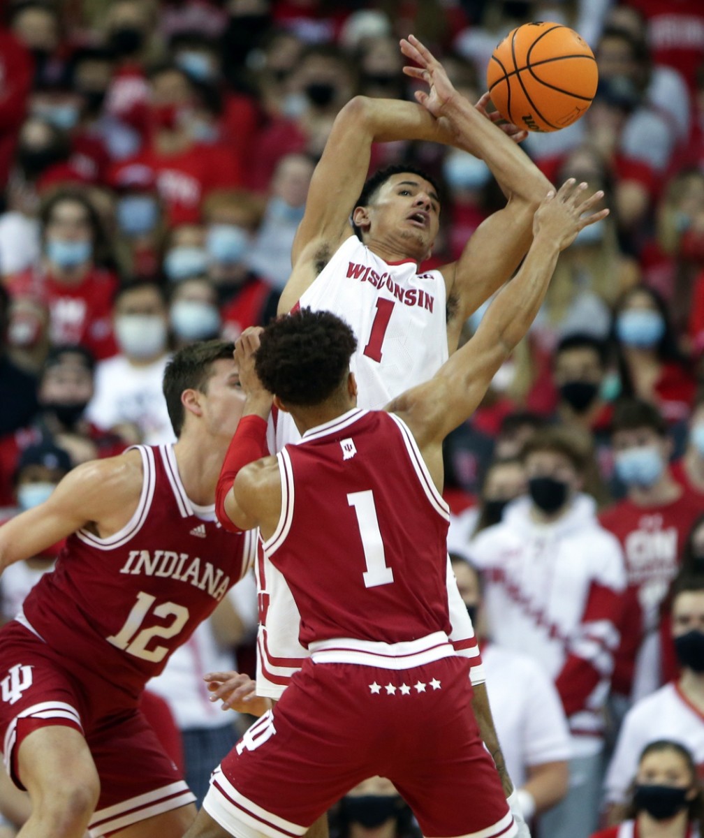 Wisconsin guard Johnny Davis has the ball tipped away from Indiana guard Rob Phinisee. (Mary Langenfeld/USA TODAY Sports)