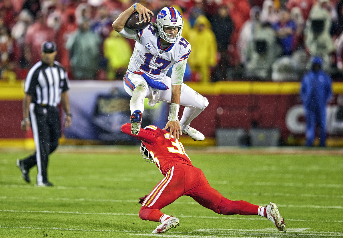 Bills quarterback Josh Allen hurdles a defender during an October 2021 regular-season win over the Chiefs.