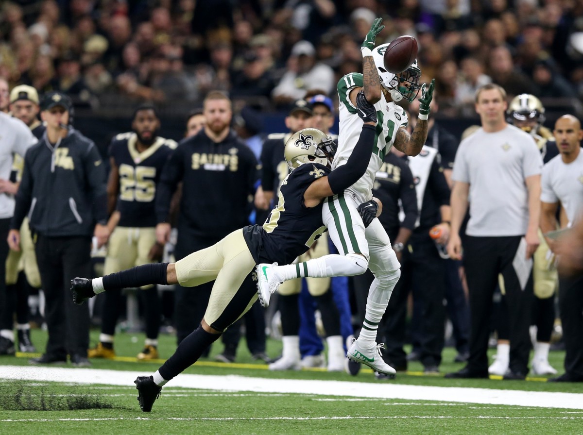 New Orleans Saints cornerback Marshon Lattimore (23) breaks up a pass against the New York Jets. Mandatory Credit: Chuck Cook-USA TODAY Sports
