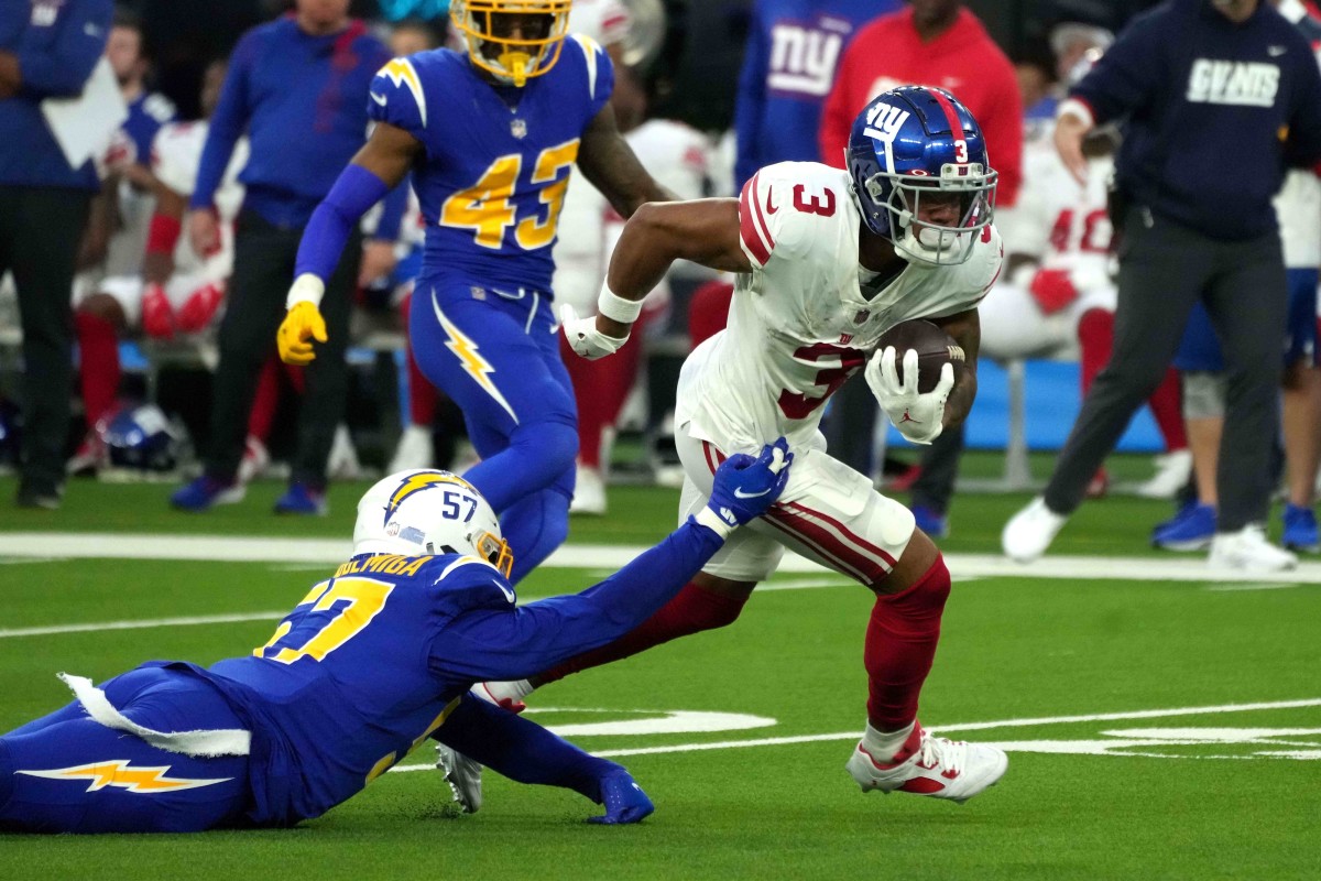 Dec 12, 2021; Inglewood, California, USA; New York Giants wide receiver Sterling Shepard (3) is defended by Los Angeles Chargers inside linebacker Amen Ogbongbemiga (57) in the fourth quarter at SoFi Stadium.