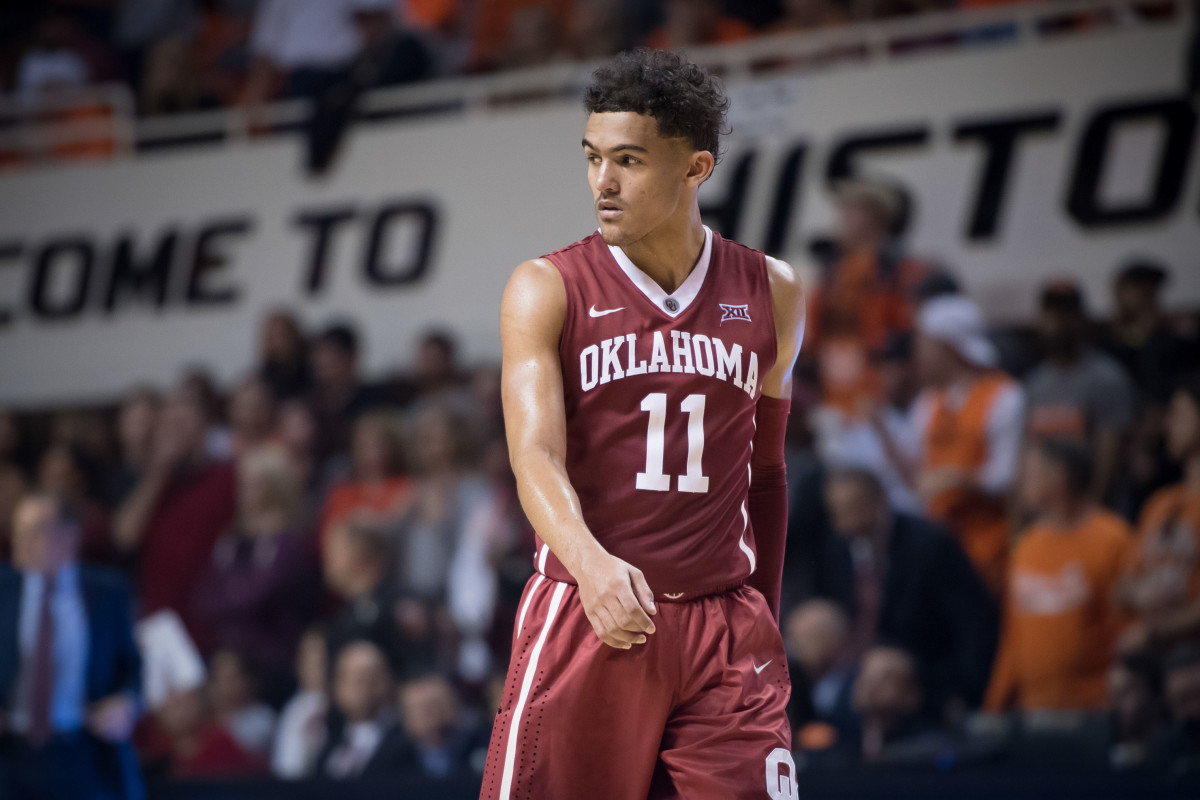 Oklahoma Sooners guard Trae Young (11) looks on during the game against the Oklahoma State Cowboys at Gallagher-Iba Arena.