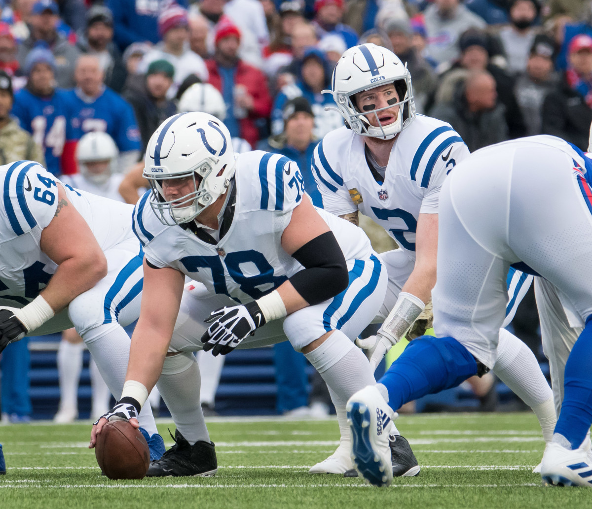 Nov 21, 2021; Orchard Park, New York, USA; Indianapolis Colts quarterback Carson Wentz (2) and center Ryan Kelly (78) at the line of scrimmage against the Buffalo Bills in the first quarter at Highmark Stadium.
