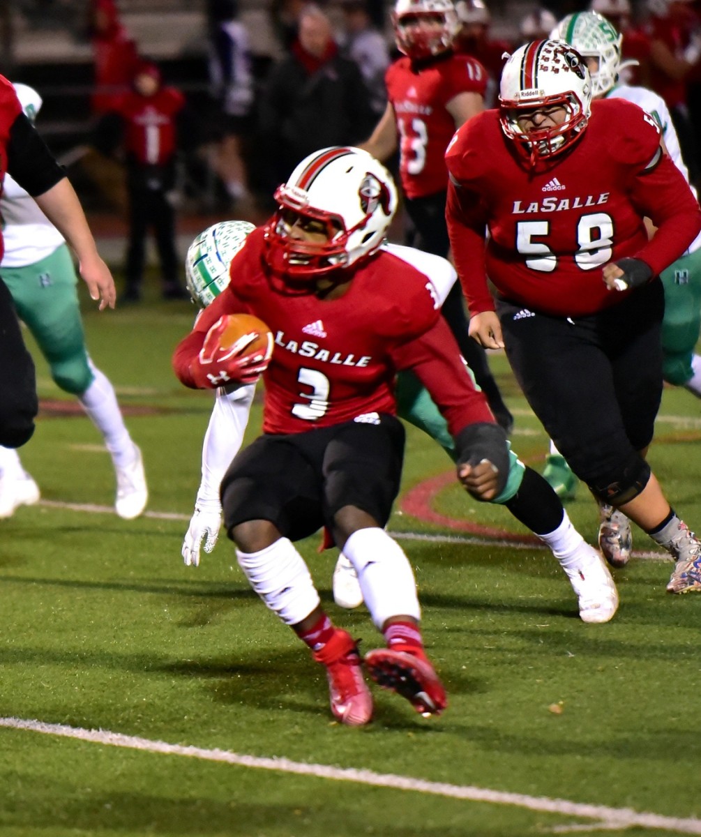 Gi'Bran Payne shifts gears on his way to a La Salle first down at the OHSAA Division II Region Championship, November 22, 2019. (Geoff Blankenship/USA TODAY Sports)
