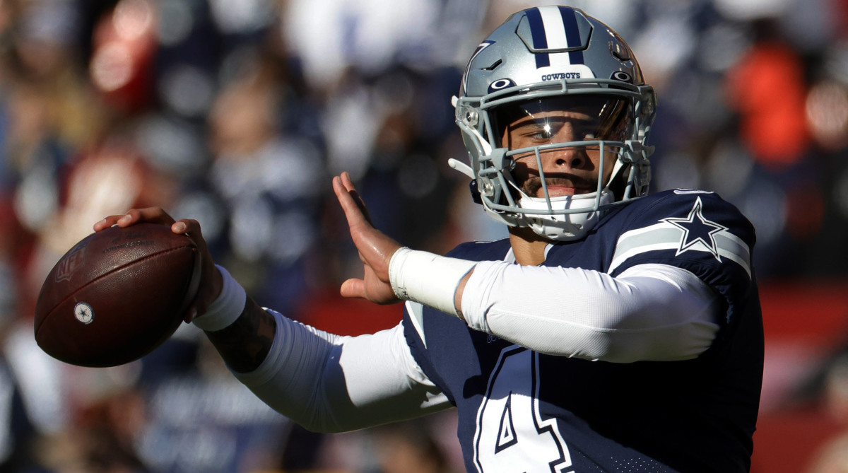 Dallas Cowboys quarterback Dak Prescott (4) passes the ball during warmups prior to the game against the Washington Football Team at FedExField.