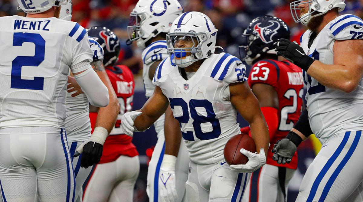 Indianapolis Colts running back Jonathan Taylor (28) celebrates after scoring a touchdown during the third quarter of the game Sunday, Dec. 5, 2021, at NRG Stadium in Houston. Indianapolis Colts Versus Houston Texans On Sunday Dec 5 2021 At Nrg Stadium In Houston Texas.
