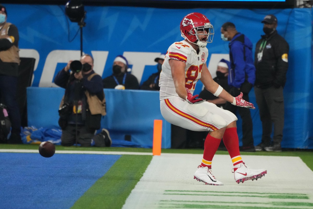 Dec 16, 2021; Inglewood, California, USA; Kansas City Chiefs tight end Travis Kelce (87) celebrates after scoring a touchdown in overtime against the Los Angeles Chargers at SoFi Stadium. Mandatory Credit: Kirby Lee-USA TODAY Sports