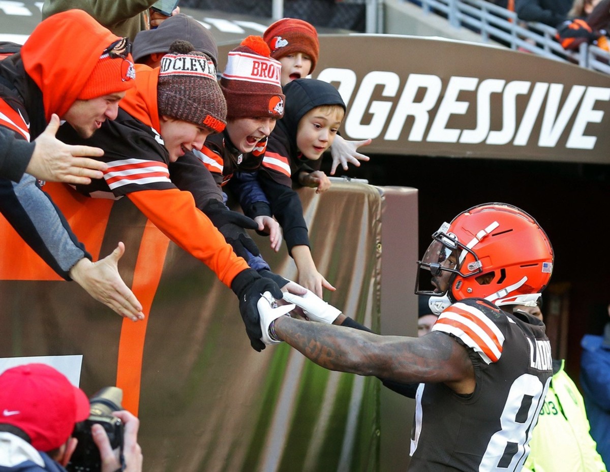 Browns wide receiver Jarvis Landry celebrates with young fans after scoring a touchdown during the first half against the Ravens on Sunday, Dec. 12, 2021, in Cleveland. Browns 12