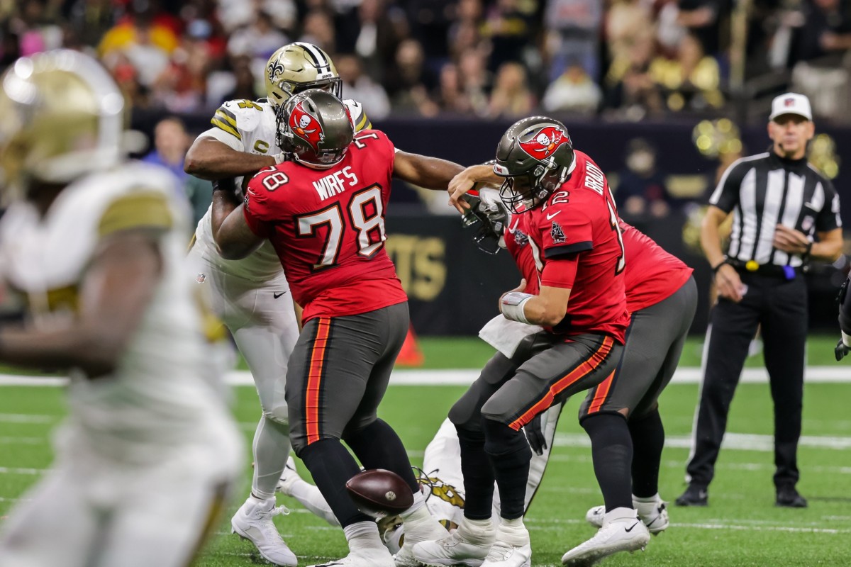 New Orleans Saints defensive end Cameron Jordan (94) knocks the ball from Tampa Bay quarterback Tom Brady (12), causing a fumble. Mandatory Credit: Stephen Lew-USA TODAY Sports