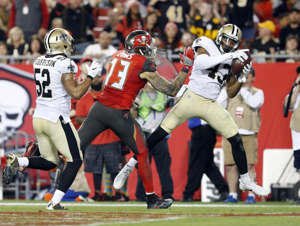New Orleans Saints free safety Marcus Williams (43) intercepts a pass intended for Tampa Bay receiver Mike Evans (13). Mandatory Credit: Reinhold Matay-USA TODAY Sports