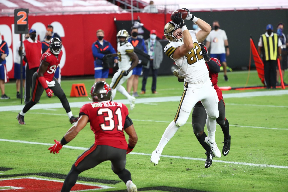 New Orleans Saints tight end Adam Trautman (82) catches a touchdown pass Tampa Bay. Mandatory Credit: Kim Klement-USA TODAY Sports