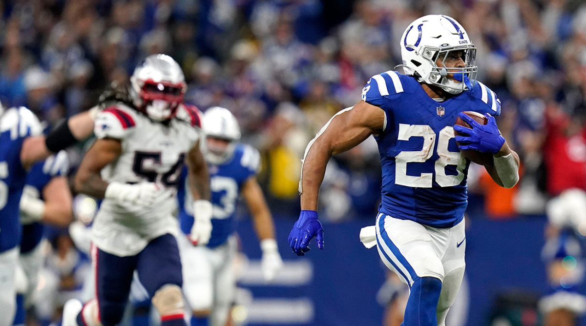 Jonathan Taylor running for a 67-yard touchdown.