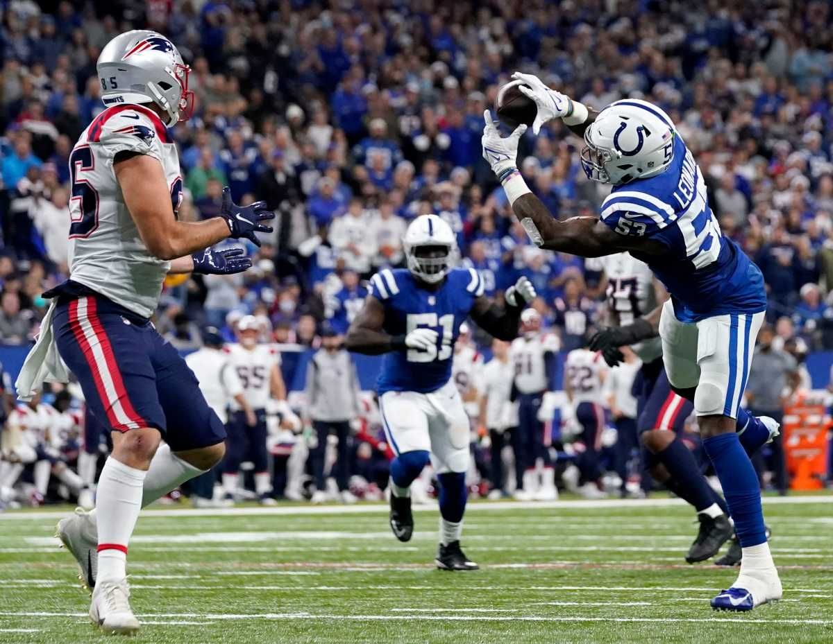 Indianapolis Colts outside linebacker Darius Leonard (53) intercepts a pass intended for New England Patriots tight end Hunter Henry (85) on Saturday, Dec. 18, 2021, during a game against the New England Patriots at Lucas Oil Stadium in Indianapolis.