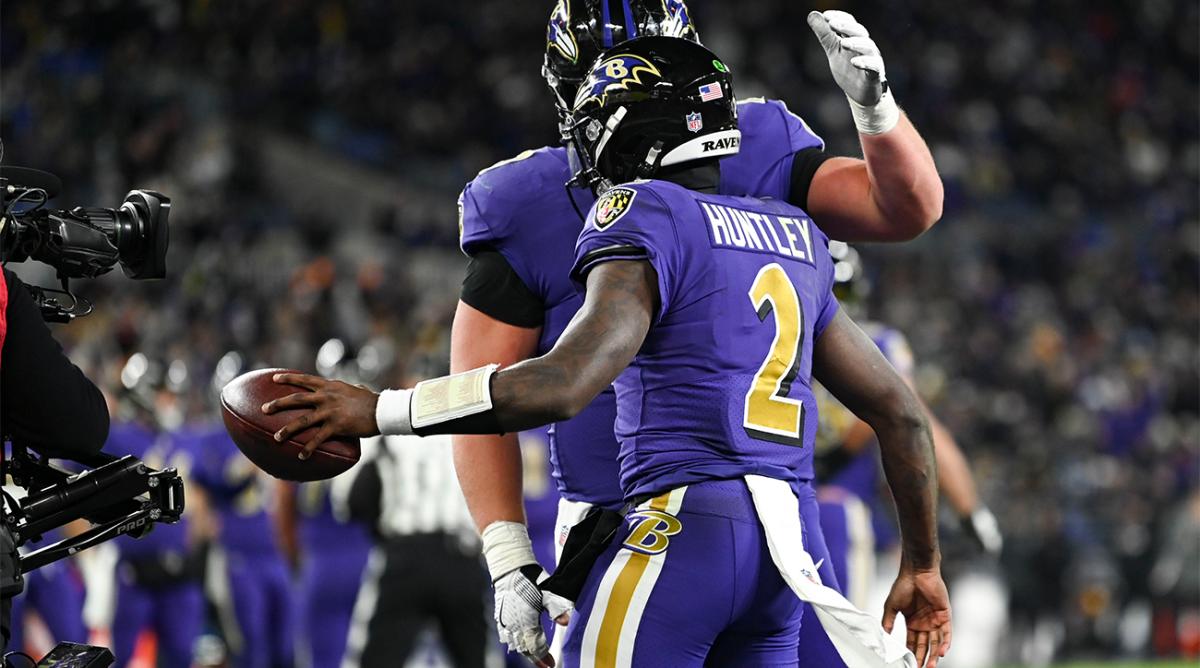 Dec 19, 2021; Baltimore, Maryland, USA; Baltimore Ravens quarterback Tyler Huntley (2) celebrates with tight end Mark Andrews (89) after scoring a touchdown during during the second half against the Green Bay Packersat M&T Bank Stadium.