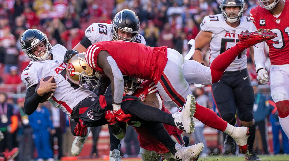 December 19, 2021; Santa Clara, California, USA; San Francisco 49ers safety Jaquiski Tartt (3) tackles Atlanta Falcons quarterback Matt Ryan (2) during the fourth quarter at Levi's Stadium.