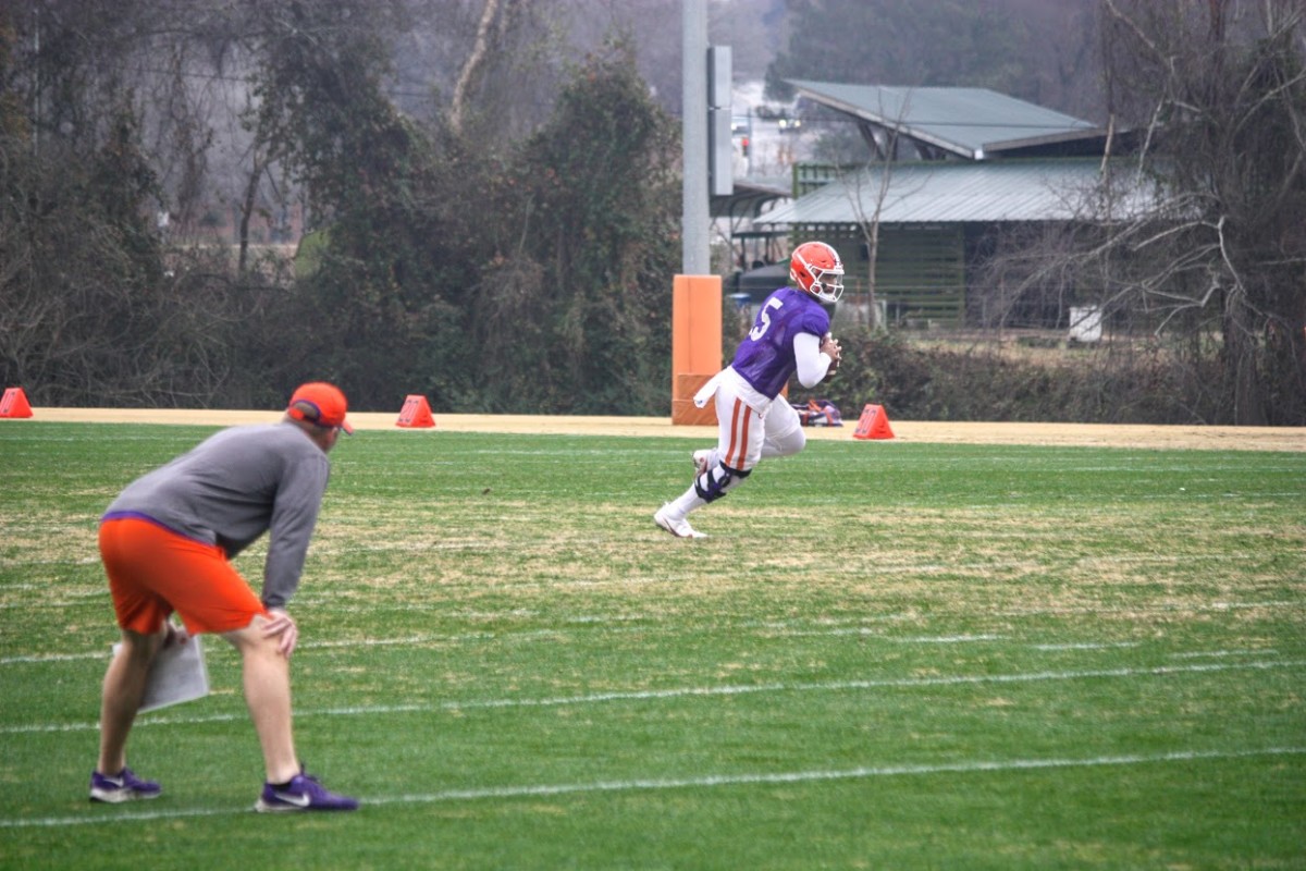 Brandon Streeter watches Clemson quarterback DJ Uiagalelei practice for the Cheez-It Bowl against Iowa State