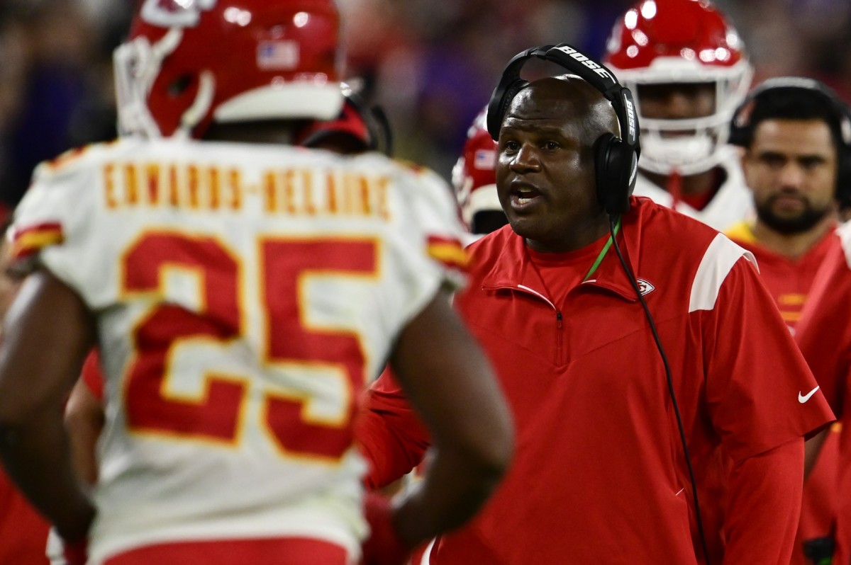 Kansas City Chiefs offensive coordinator Eric Bieniemy talks with players after the play during the first half against the Baltimore Ravens at M&T Bank Stadium.
