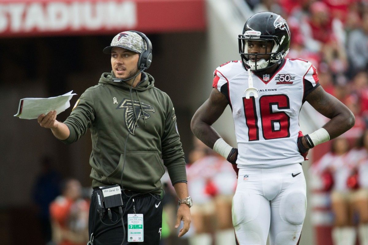 Atlanta Falcons offensive assistant Mike McDaniel (left) and wide receiver Justin Hardy (16) during the third quarter against the San Francisco 49ers at Levi's Stadium. The 49ers defeated the Falcons 17-16.