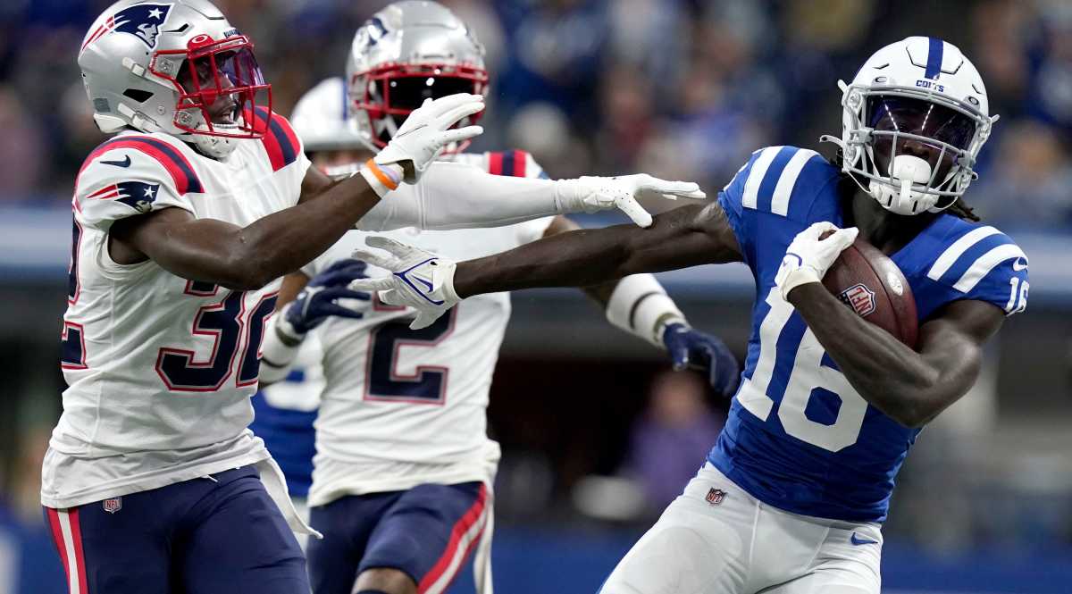New England Patriots free safety Devin McCourty (32) shoves Indianapolis Colts wide receiver Ashton Dulin (16) out of bounds Saturday, Dec. 18, 2021, during a game against the New England Patriots at Lucas Oil Stadium in Indianapolis. Syndication The Indianapolis Star