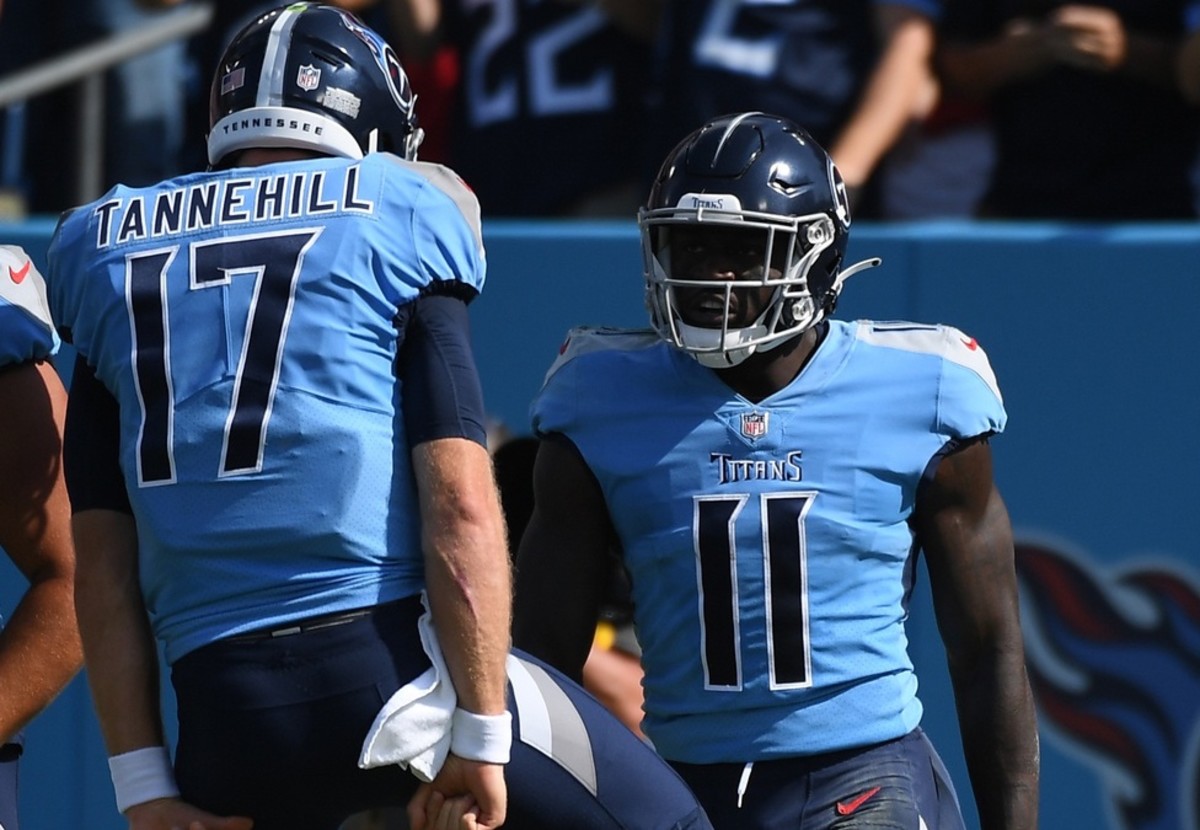 Tennessee Titans wide receiver A.J. Brown (11) and Tennessee Titans quarterback Ryan Tannehill (17) celebrate after a touchdown pass against the Kansas City Chiefs at Nissan Stadium.
