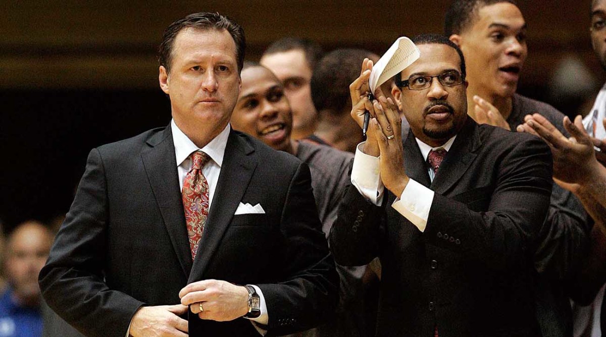 North Carolina State Wolfpack head coach Mark Gottfried and assistant coach Orlando Early (right) in their game against the Duke Blue Devils.