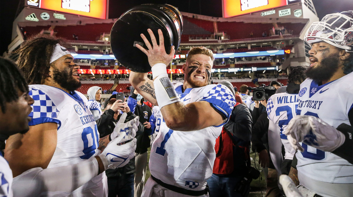 Kentucky quarterback Will Levis holds the Governor's Cup trophy after the Wildcats defeated Louisville 52-21 Saturday night. Nov. 27, 2021 Louisville Vs Kentucky 2021 Governors Cup