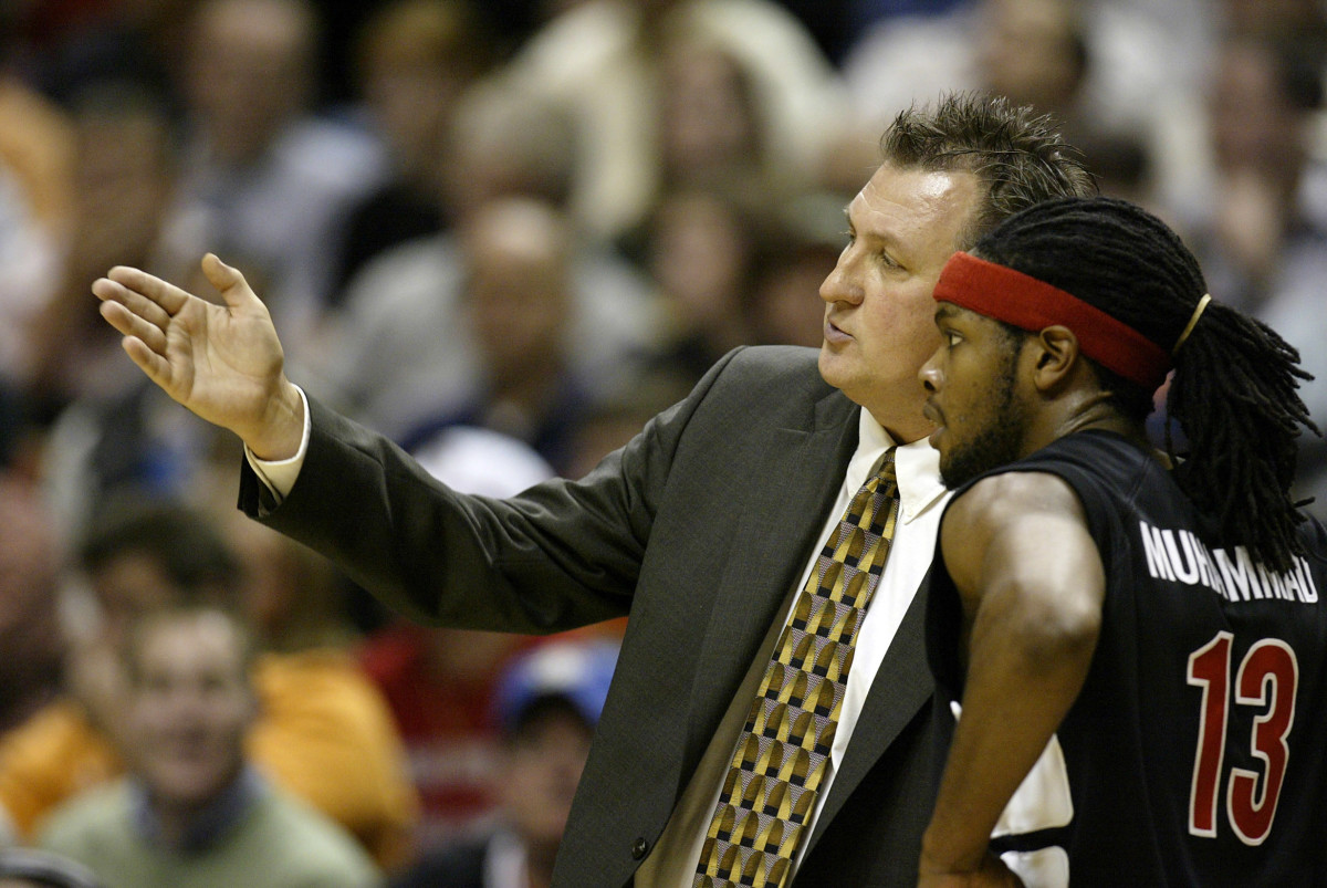Nov 27, 2004; Indianapolis, IN, USA; Cincinnati guard #13 Jihad Muhammad gets a lecture from coach Bob Huggins during first half action against Purdue at the Wooden Tradition on Saturday at Conseco Fieldhouse. Mandatory Credit: Photo by Joe Robbins-USA TODAY Sports (c) 2004 by Joe Robbins