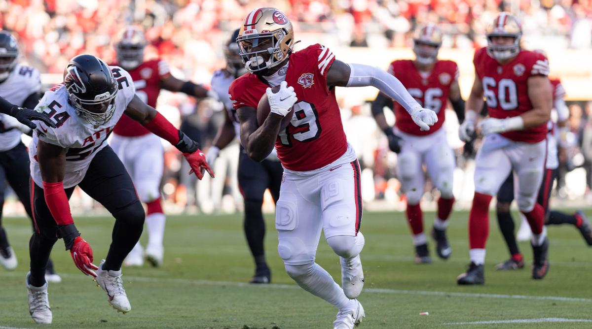 Dec 19, 2021; Santa Clara, California, USA; San Francisco 49ers wide receiver Deebo Samuel (19) runs with the ball for a touchdown during the second quarter against the Atlanta Falcons at Levi's Stadium.