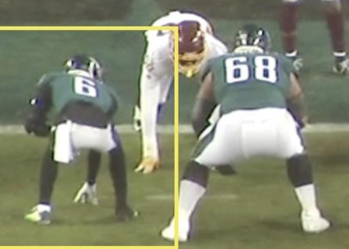 DeVonta Smith in a three-point stance next to Jordan Mailata