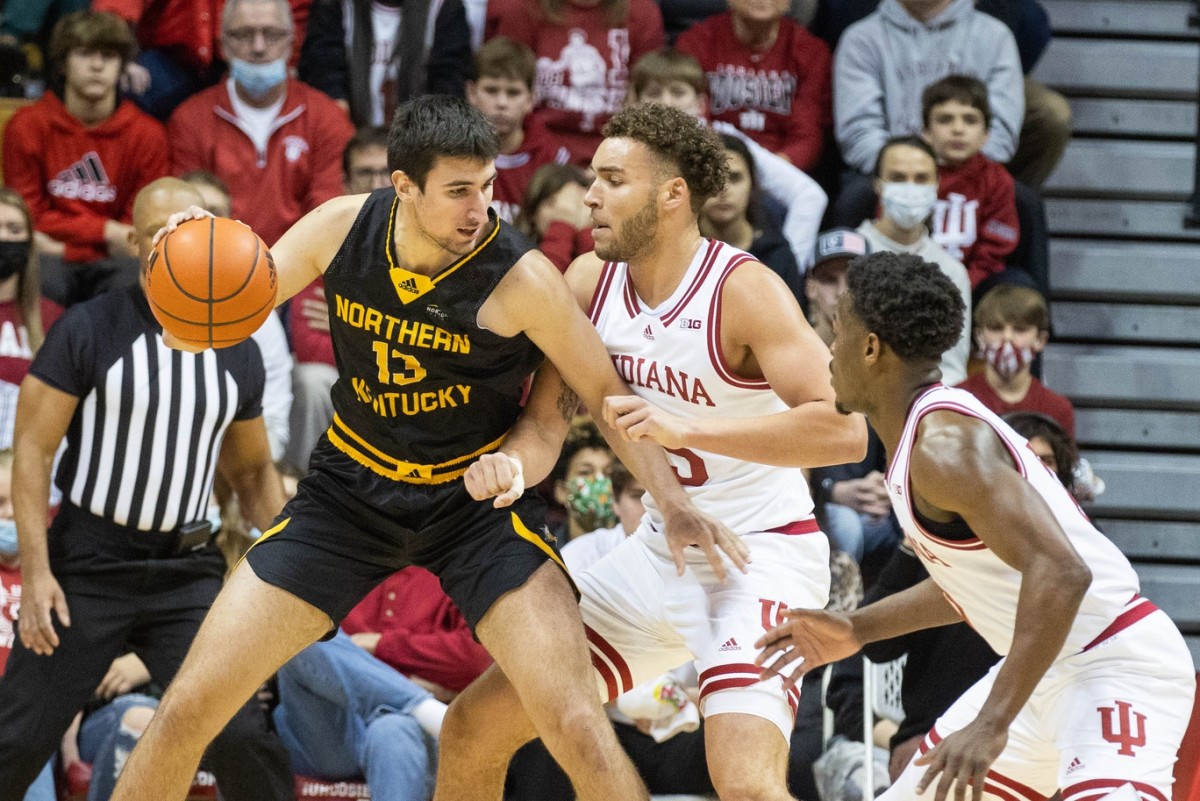 Northern Kentucky forward David Bohm (13) dribbles the ball while Indian forward Race Thompson (25) defends  (Trevor Ruszkowski-USA TODAY Sports)