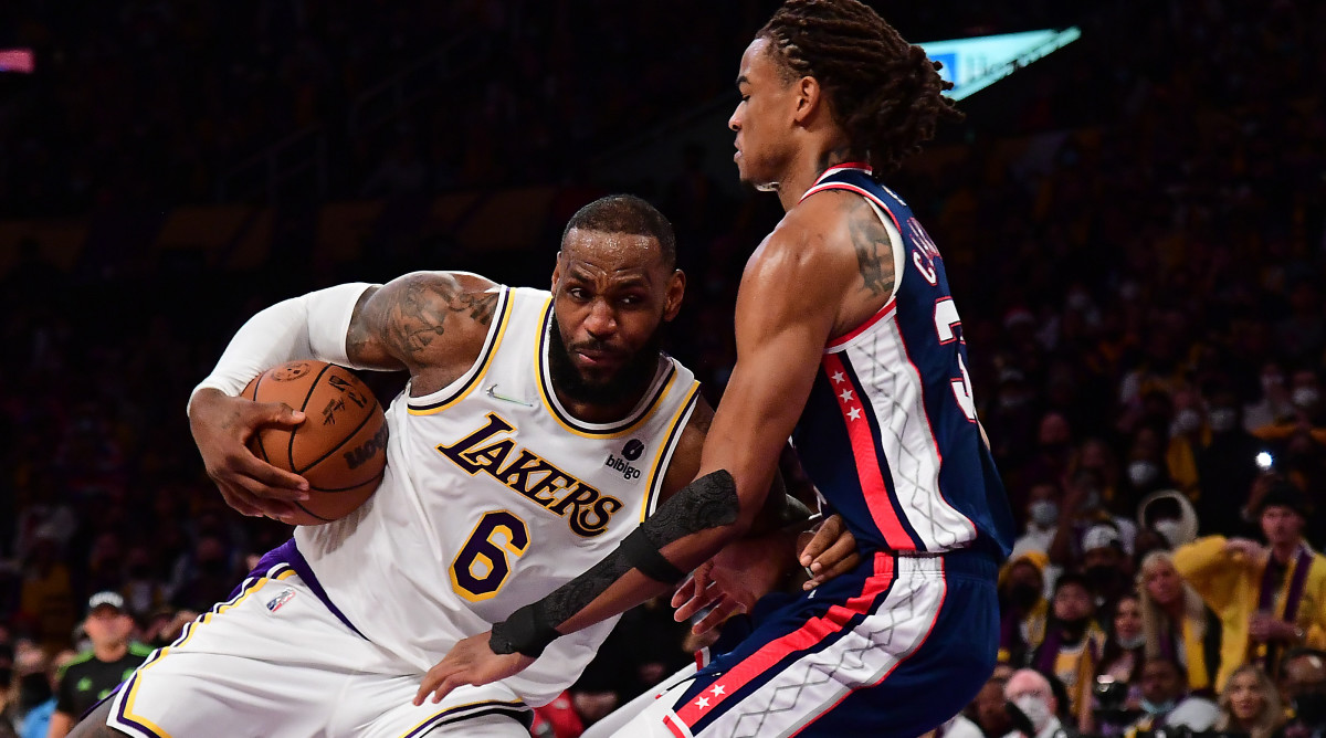 Los Angeles Lakers forward LeBron James (6) moves to the basket against Brooklyn Nets forward Nic Claxton (33) during the second half at Crypto.com Arena.